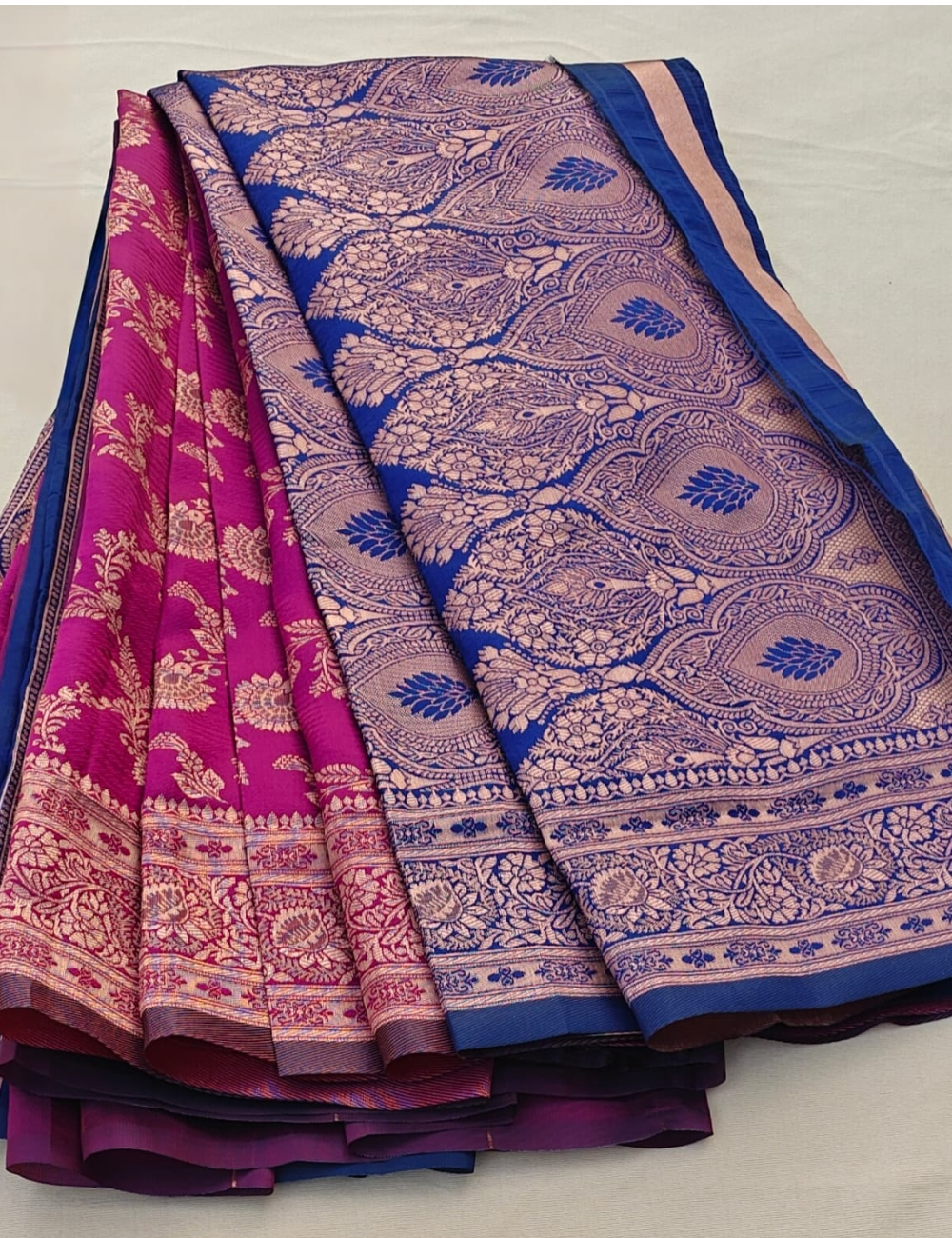 Magenta Silk Blend Saree with Antique Gold Floral Weaving & Royal Blue Contrast Border