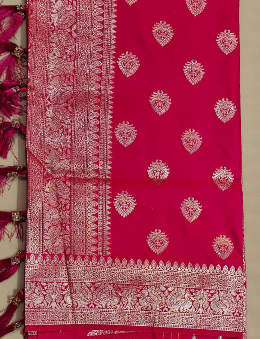 Vibrant Pink and Golden Zari Woven Sari