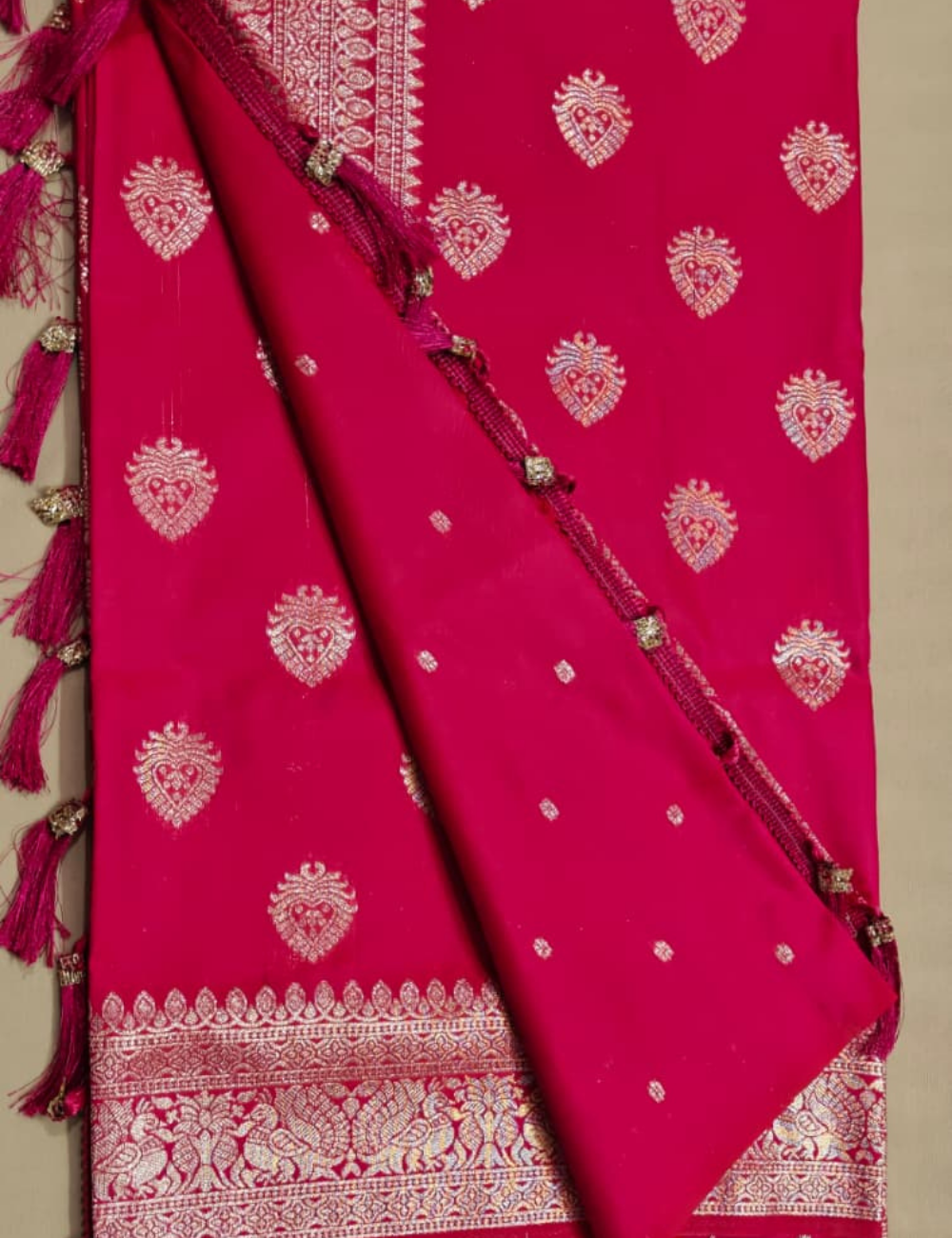 Vibrant Pink and Golden Zari Woven Sari