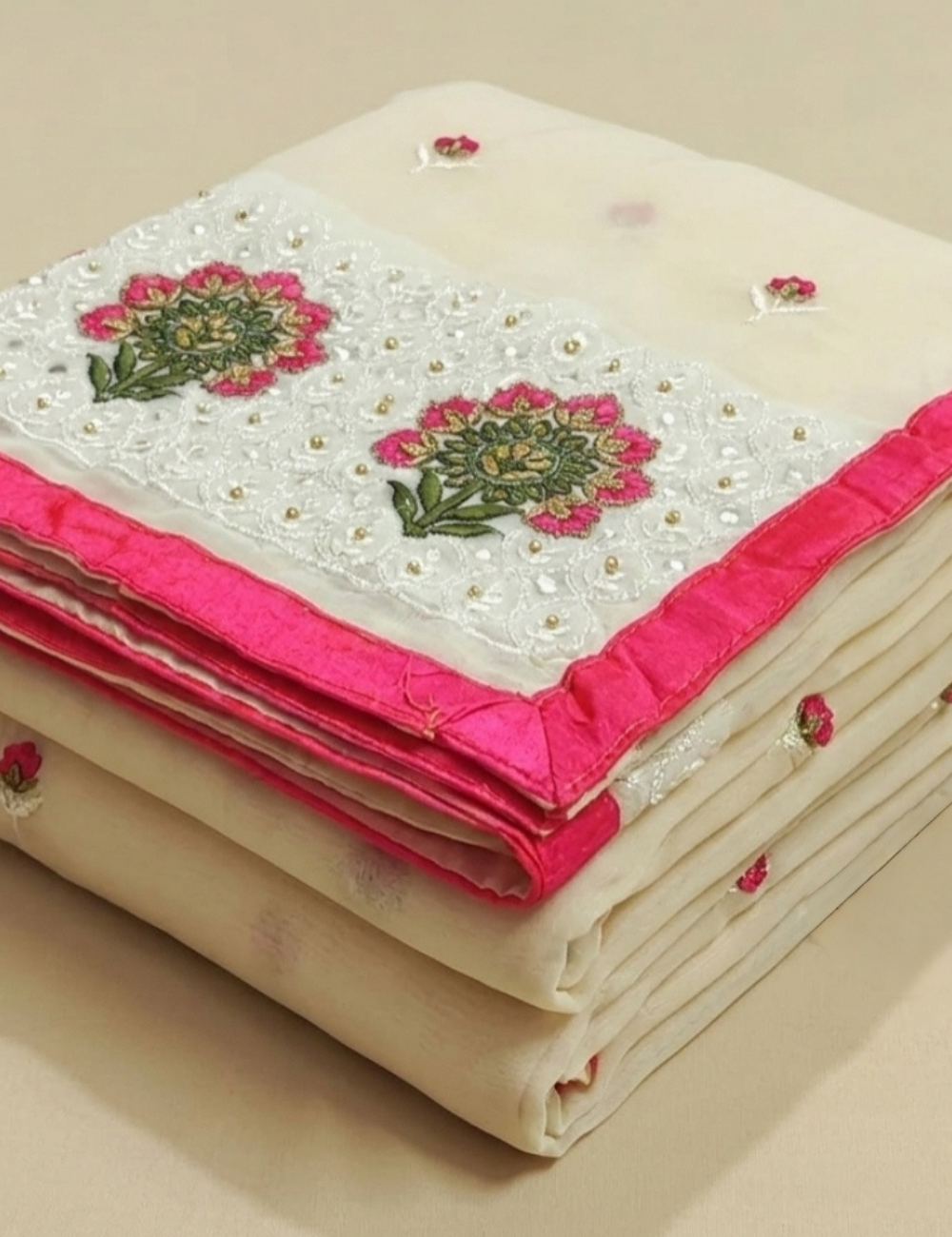 Elegant Cream Saree with Pink Floral Embroidery