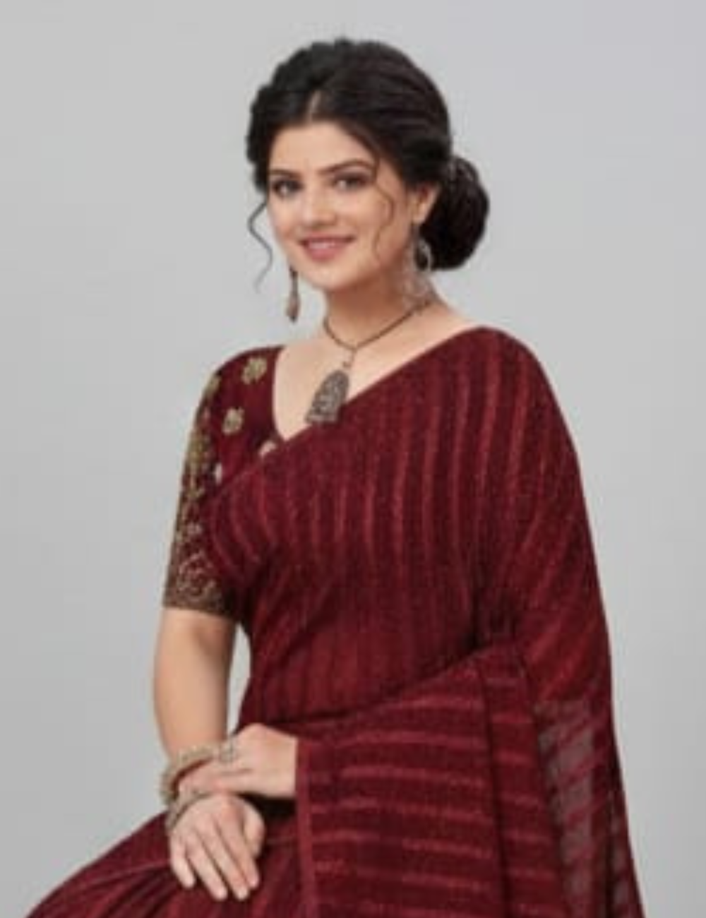 Magenta Embroidered Saree with Tassel Border