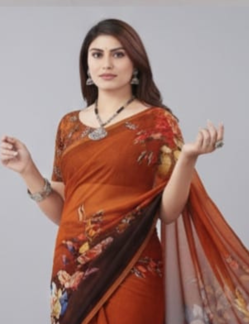 Brown Saree with Vibrant Floral Prints