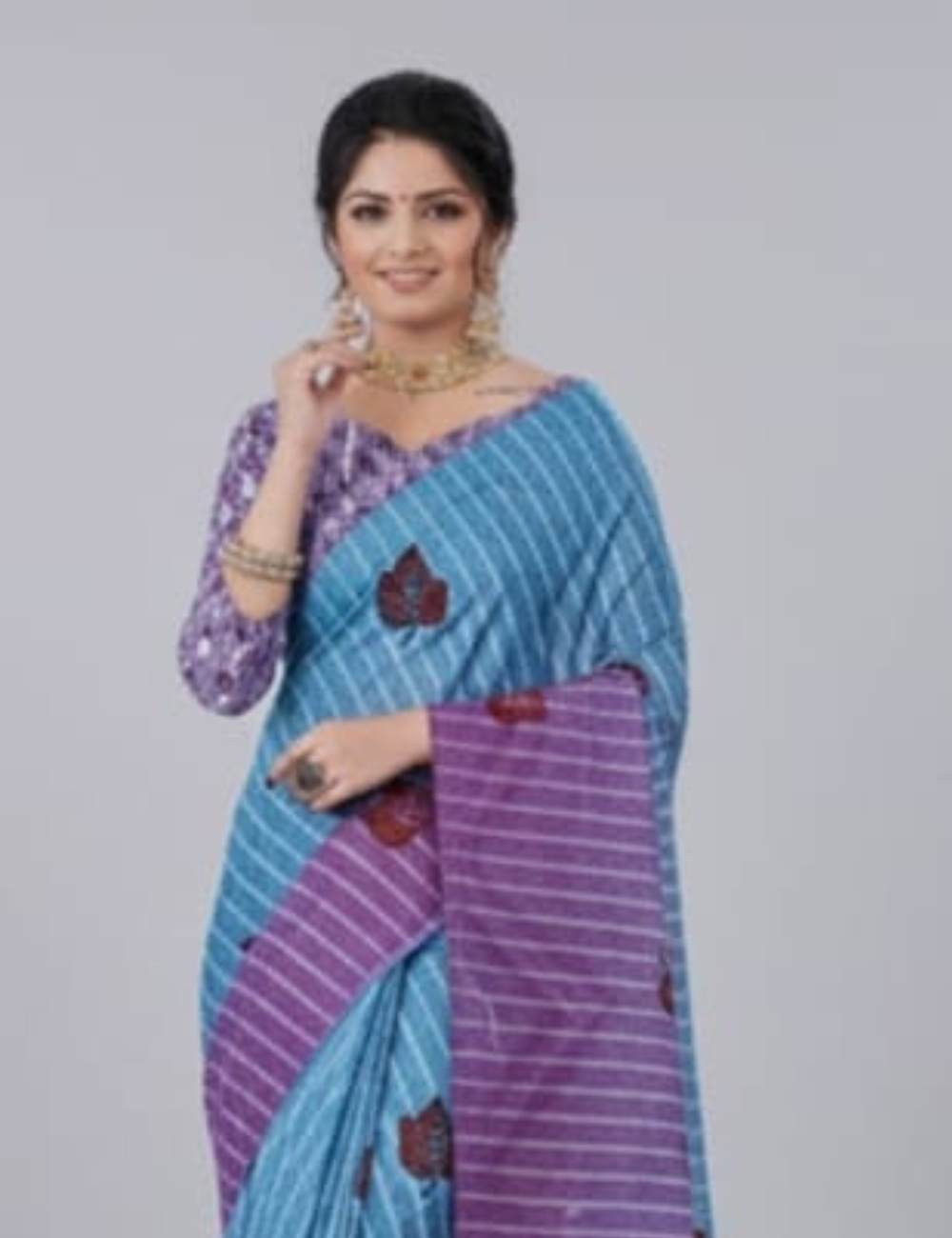 Vibrant Pink and Blue Saree with Leaf Motif and Fringed Border