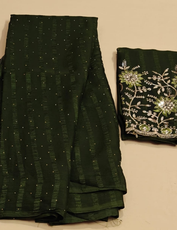 Elegant Dark Green Embroidered Saree with Tassel Detailing