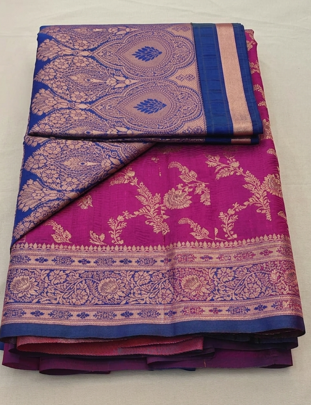 Magenta Silk Blend Saree with Antique Gold Floral Weaving & Royal Blue Contrast Border