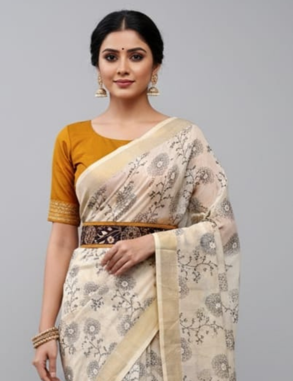 Cream Saree with Mustard Embroidered Blouse