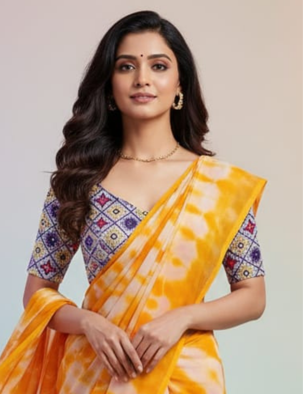 Bright Yellow Tie-Dye Saree with Tassel Border & Printed Blouse
