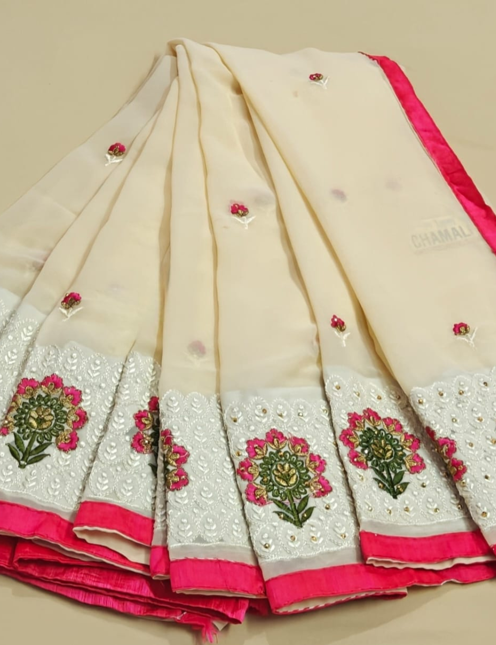 Elegant Cream Saree with Pink Floral Embroidery