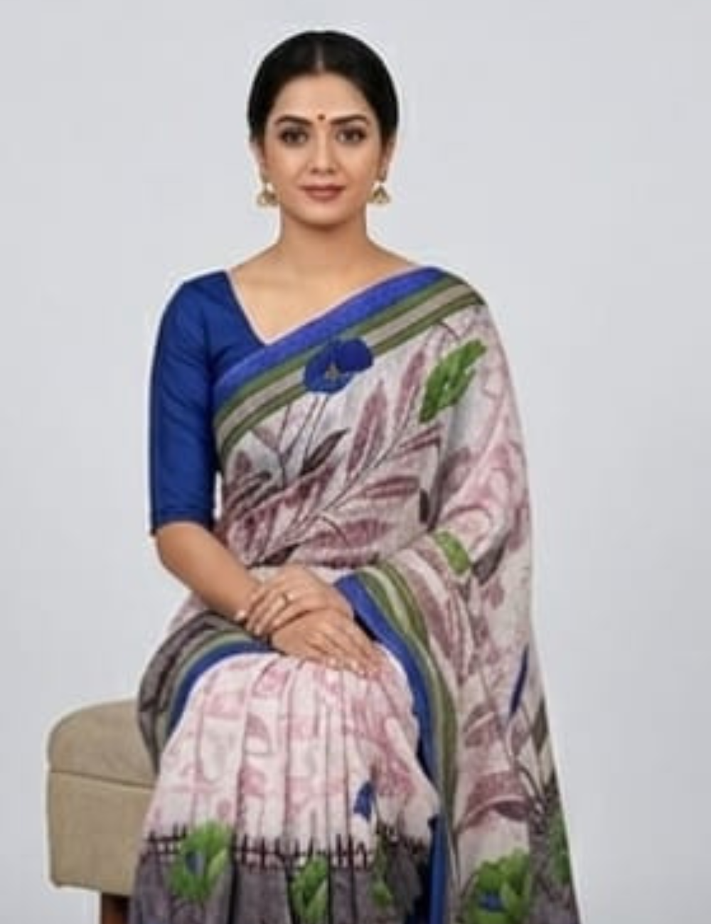 Elegant Cream Floral Printed Saree with Royal Blue Border