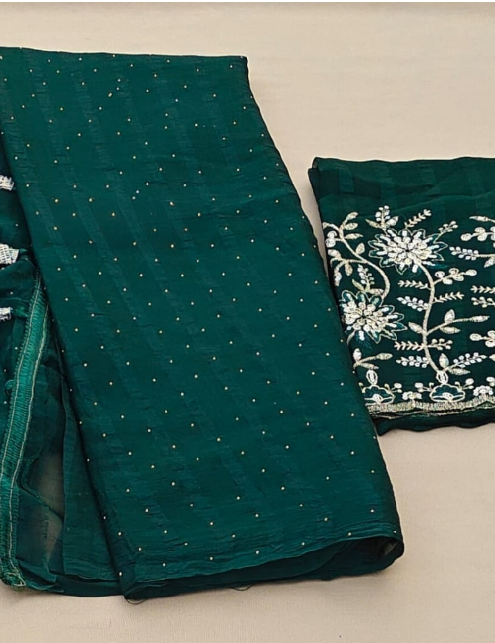 Elegant Deep Green Embroidered Saree with Tassel Detailing