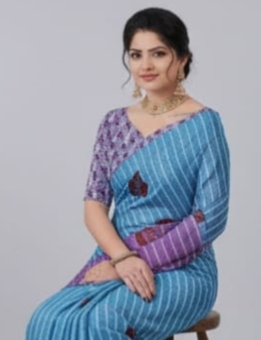 Vibrant Pink and Blue Saree with Leaf Motif and Fringed Border