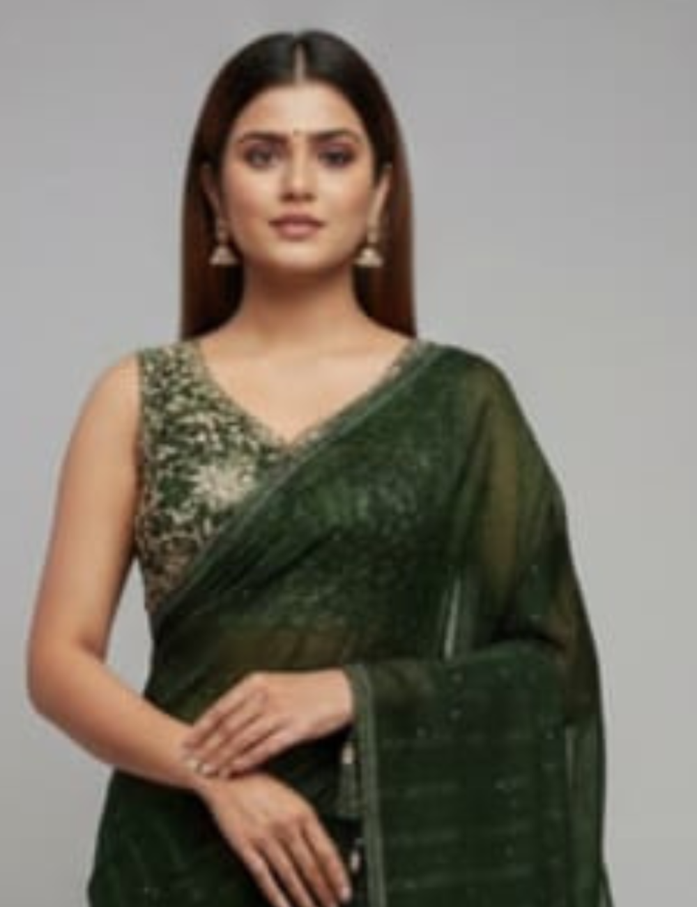Elegant Dark Green Embroidered Saree with Tassel Detailing