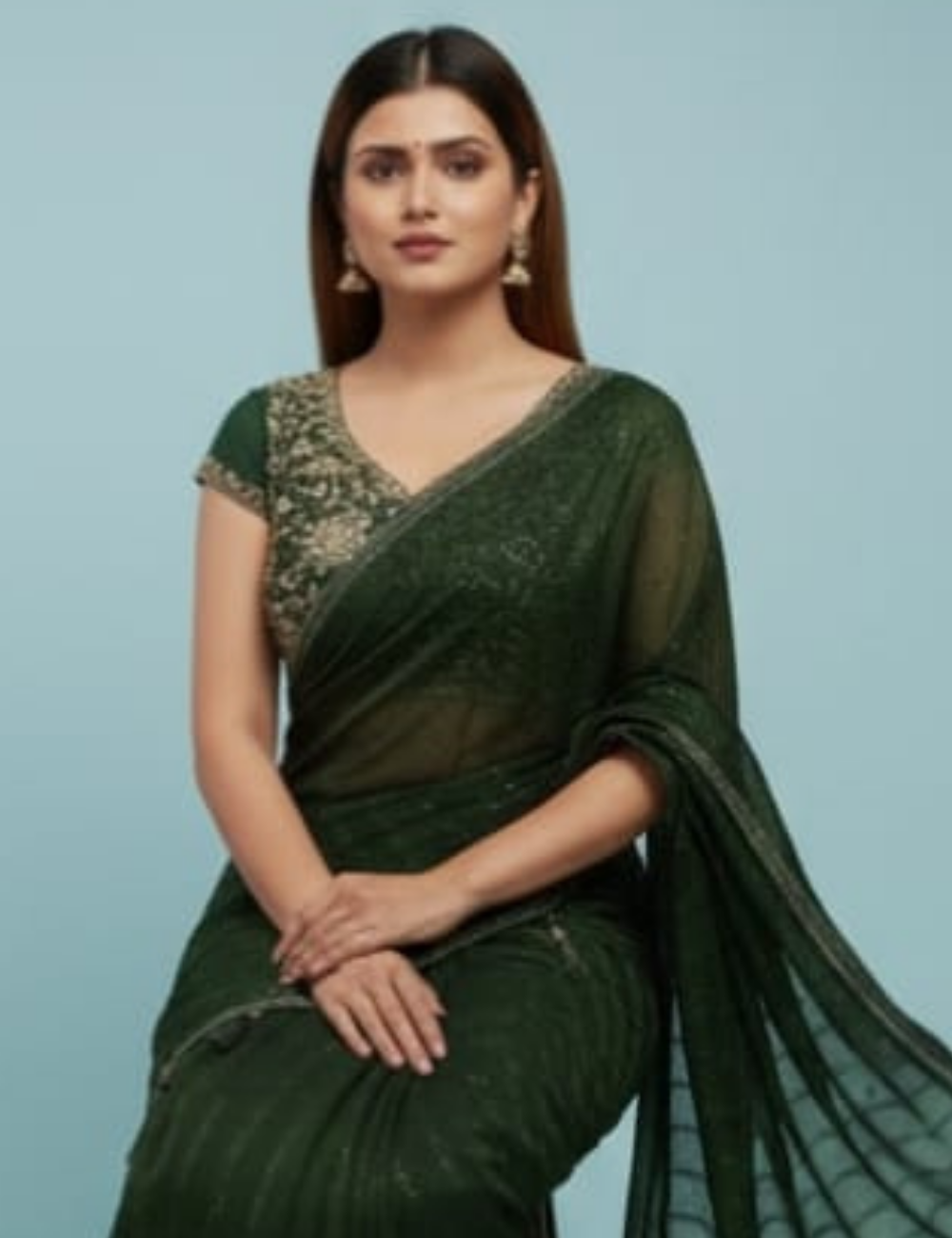 Elegant Dark Green Embroidered Saree with Tassel Detailing