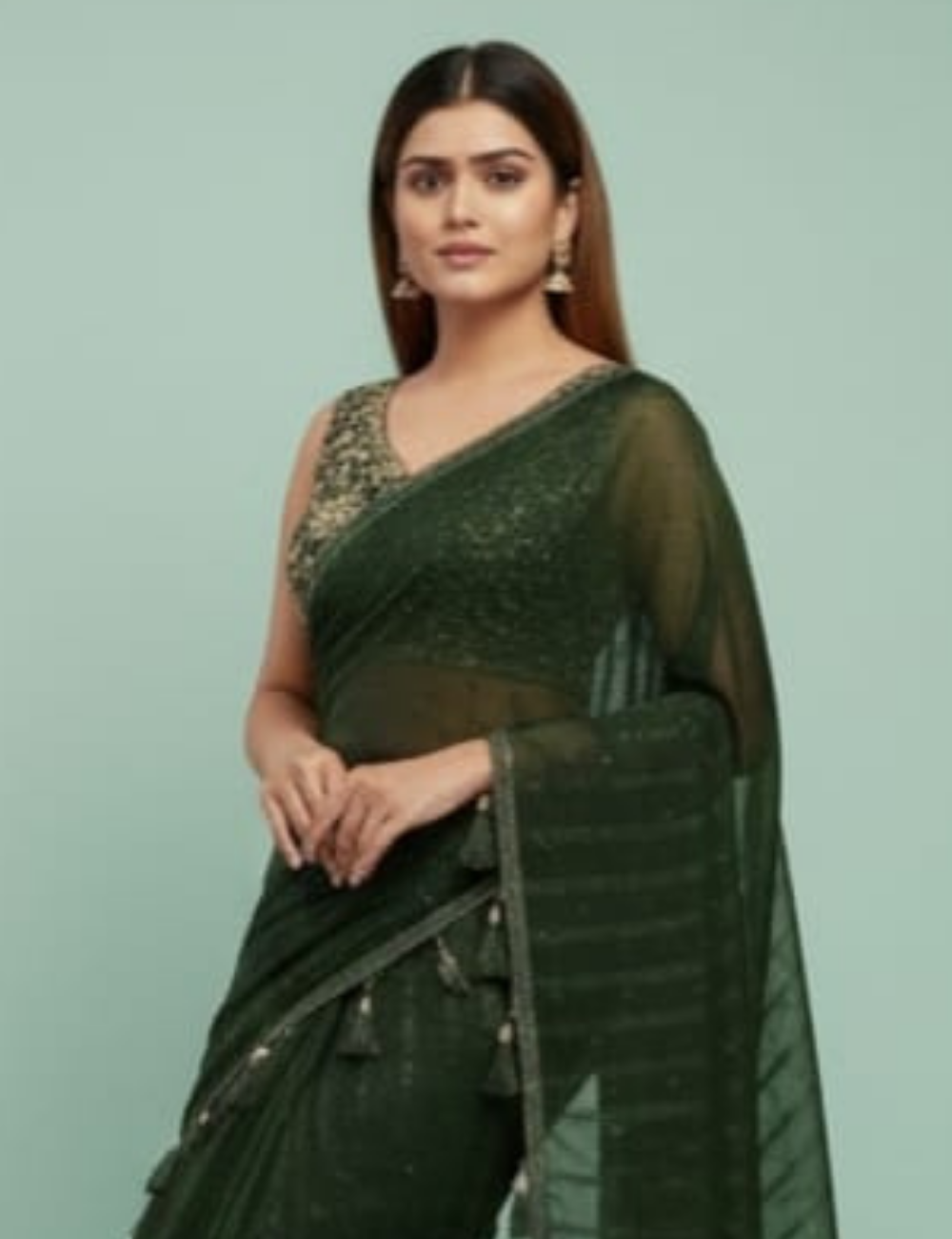 Elegant Dark Green Embroidered Saree with Tassel Detailing