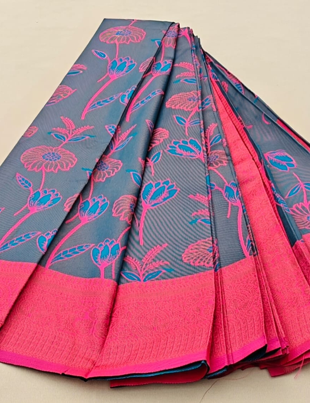 Elegant Grey Saree with Pink Floral Design and Border