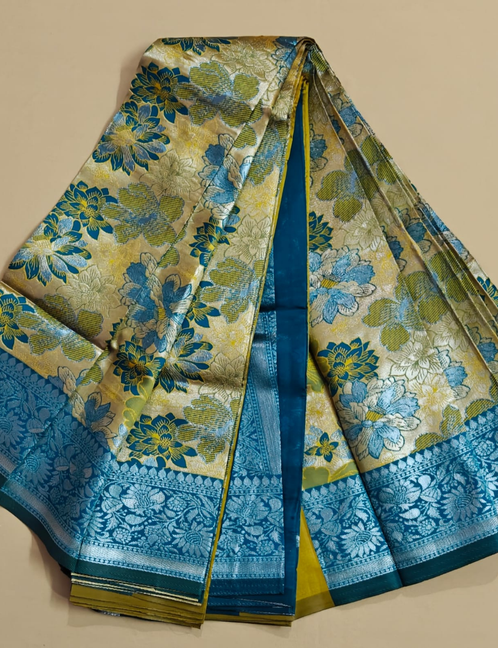 Elegant Teal and Gold Floral Art Silk Saree