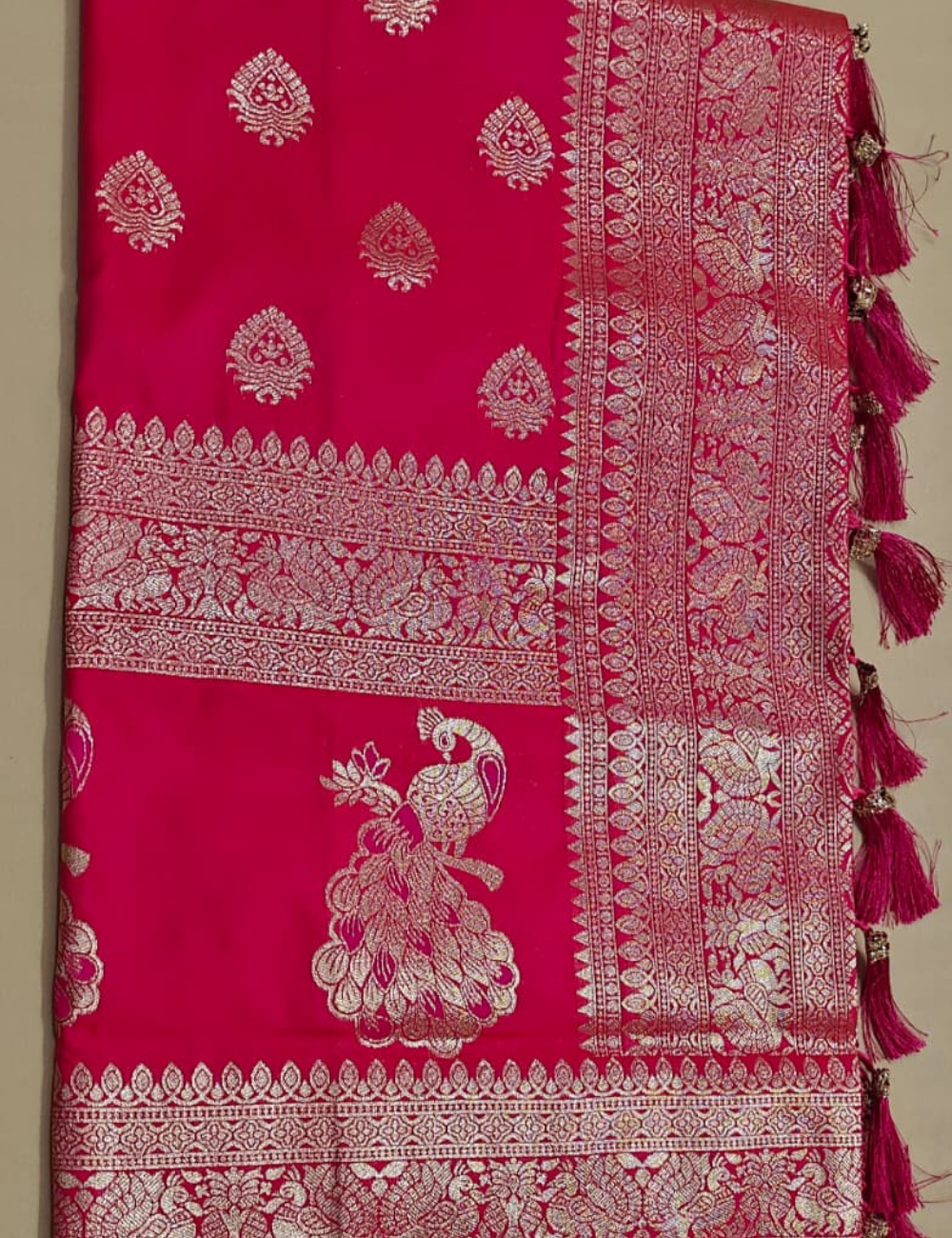 Vibrant Pink and Golden Zari Woven Sari