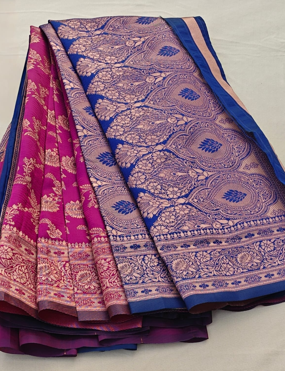 Magenta Silk Blend Saree with Antique Gold Floral Weaving & Royal Blue Contrast Border